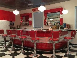 Find real metal banding with a chrome column base with our Diner tables and chairs - photo